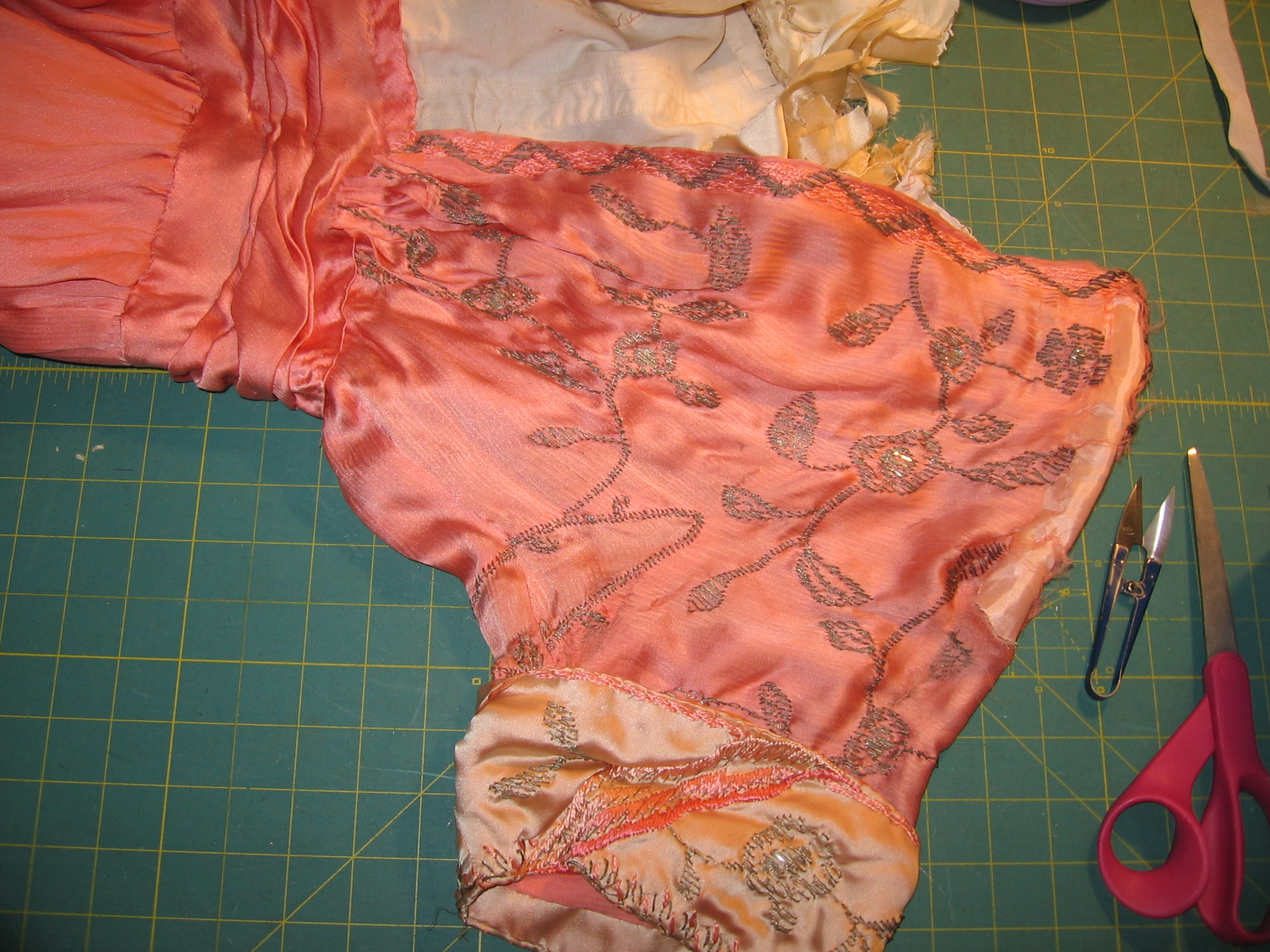 An underarm gusset was added for better fit and then embroidered to blend into the overall design.